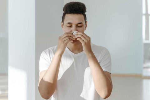 Another Severe Allergy Season. Image courtesy Pexels: https://www.pexels.com/photo/sick-man-in-white-shirt-wiping-his-nose-with-tissue-7596886/