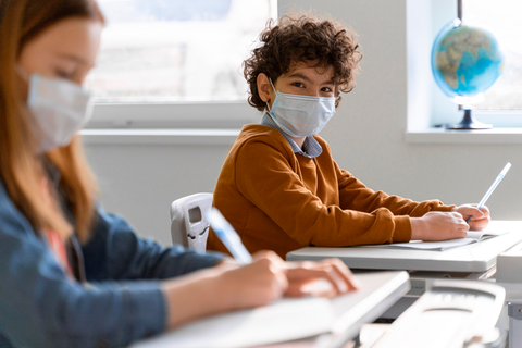 side-view-children-with-medical-masks-classroom-learning